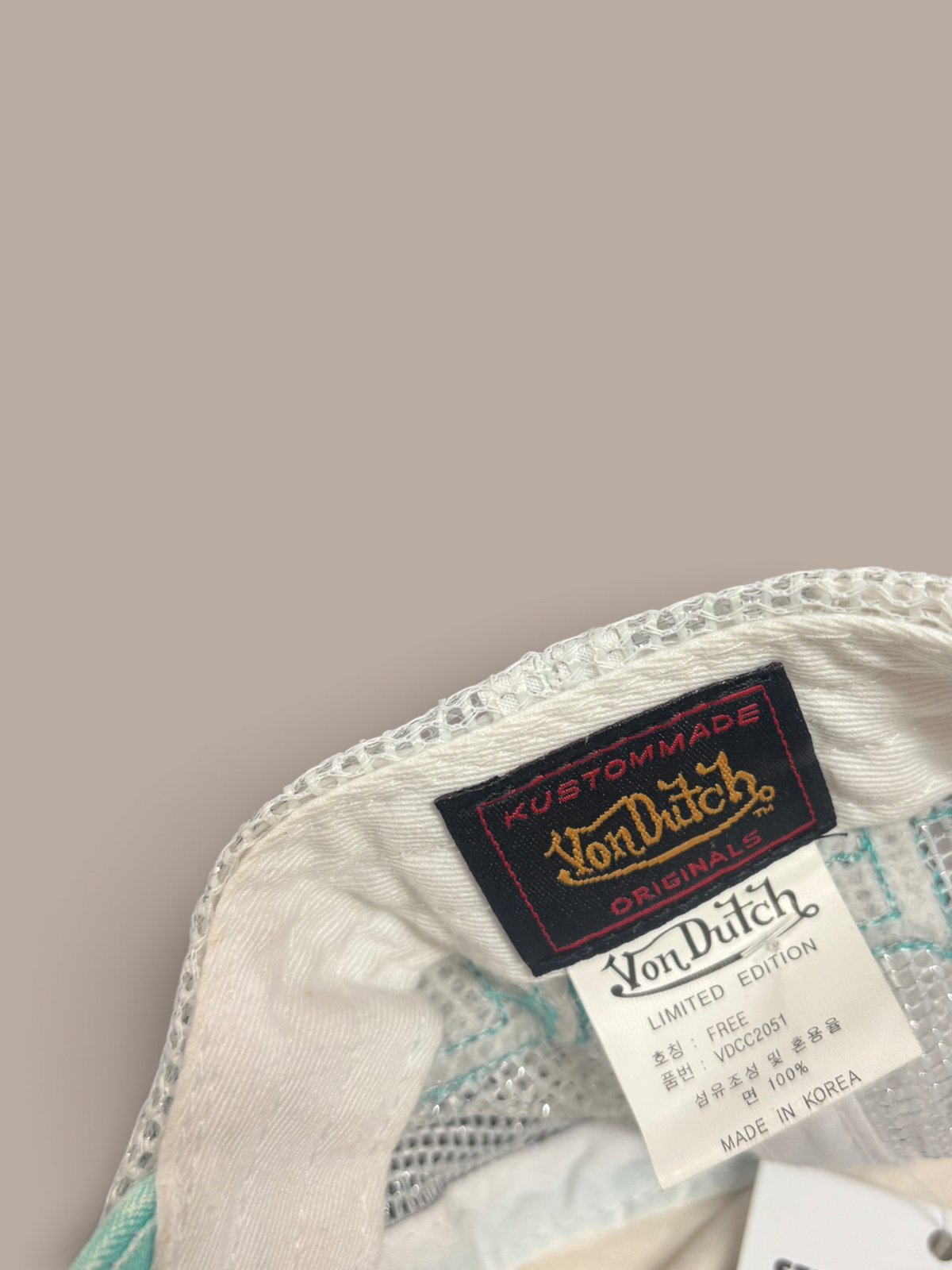 von dutch cap teal with white detailing.