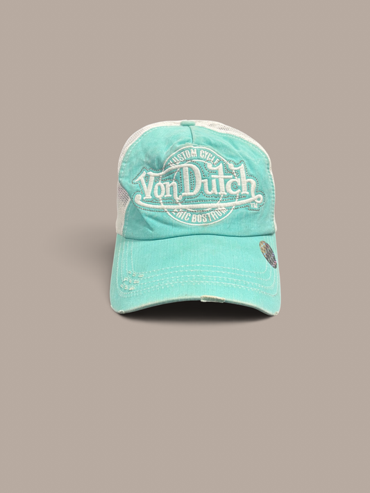 von dutch cap teal with white detailing.