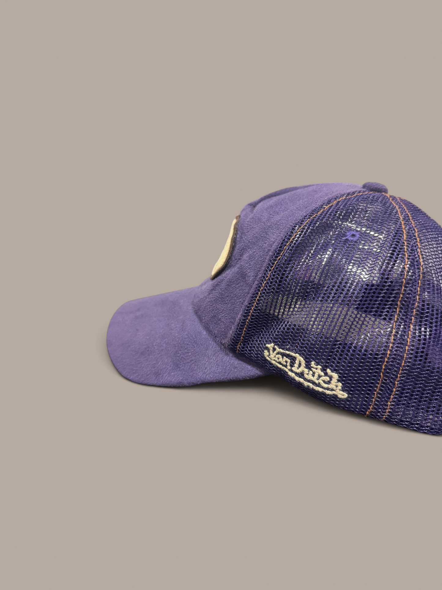 purple von dutch hat  suede , fluffy on inside.