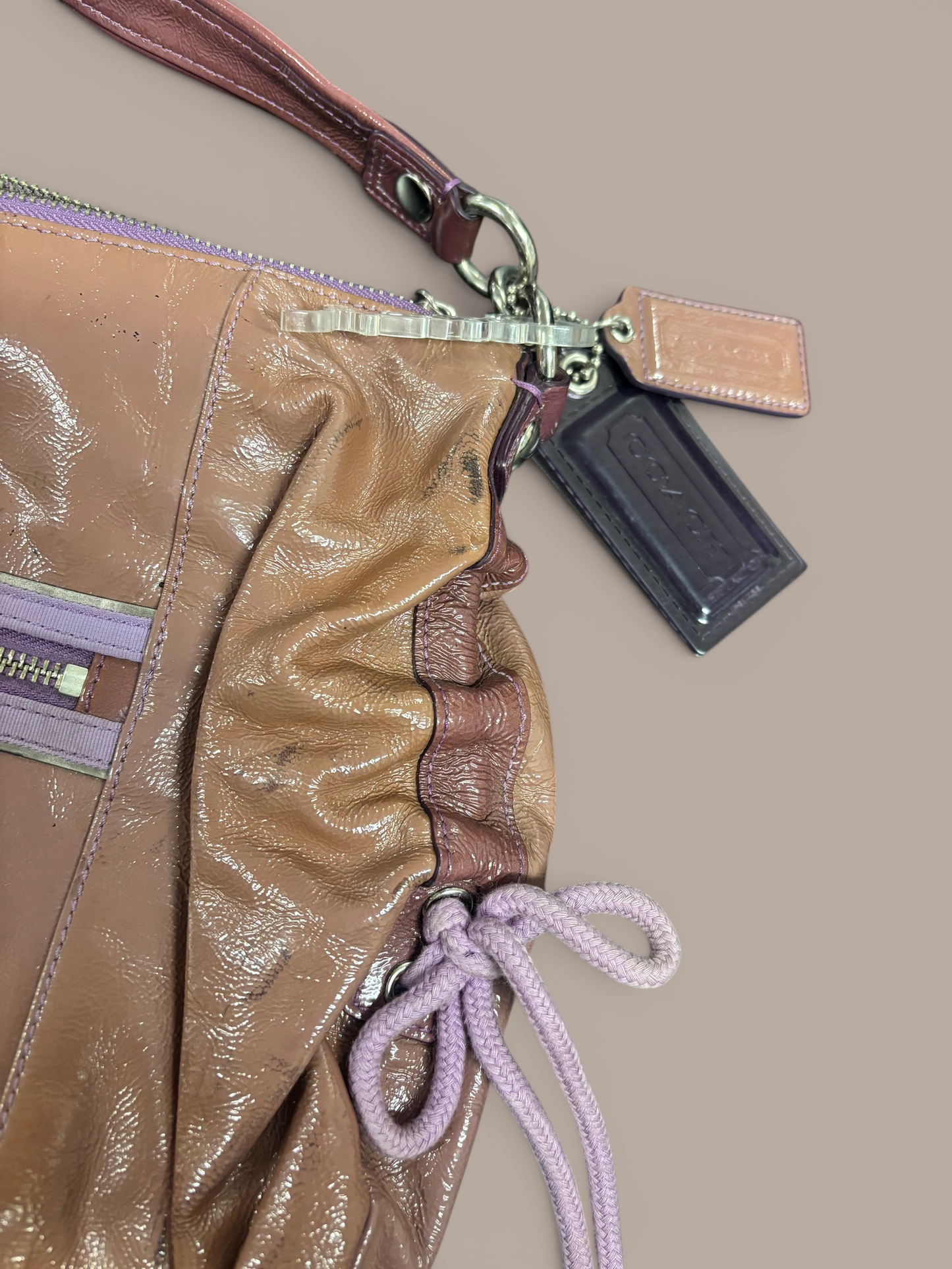 poppy jazzy collection brown and purple coach bag