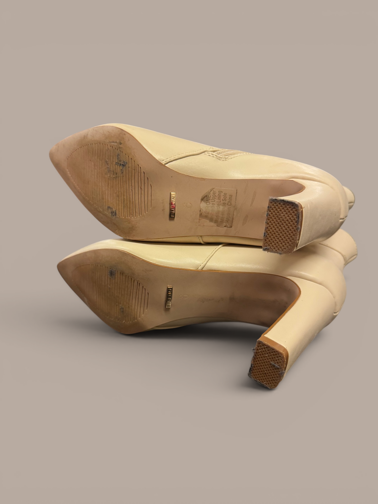 billion beige heeled boot